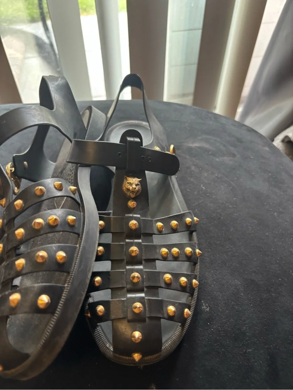 Black Gucci Studded Gladiator Sandals with Gold Accents